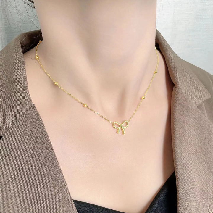 Goltique necklace styled on a model